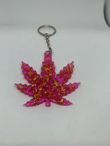 weed transparent pink with gold flakes