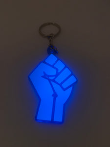 fist blue glow in dark with transparent blue background